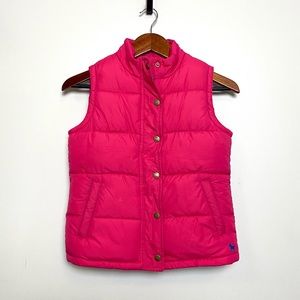 Girls raspberry colored Boden Kids puffer vest.